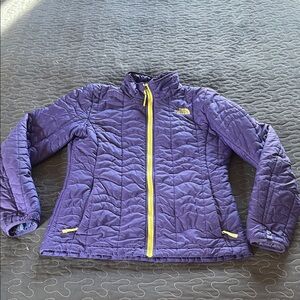 The North Face Violet Puffer Jacket with Gold Zipper